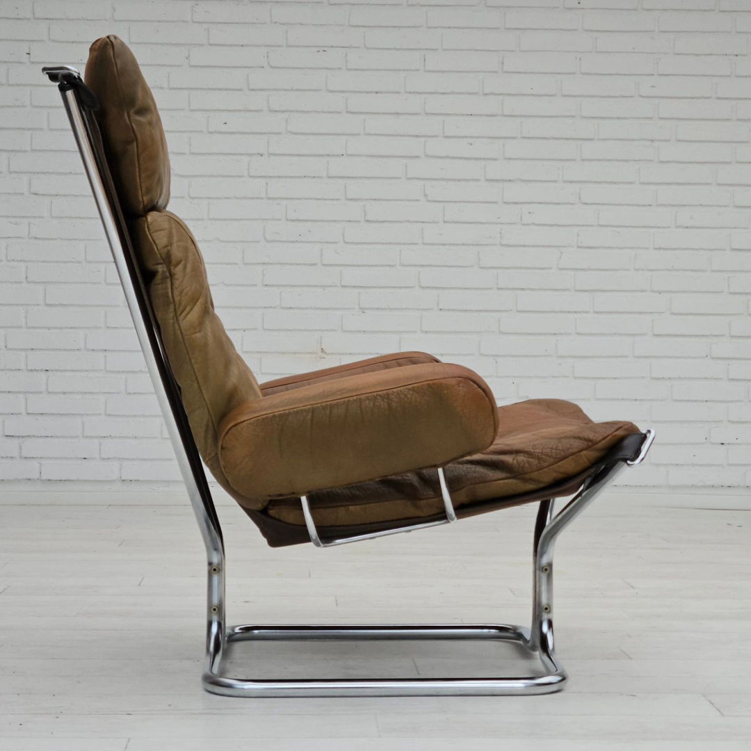 1970s, Norwegian design by Harald Relling, original condition, leather, chrome steel, teak wood, canvas.