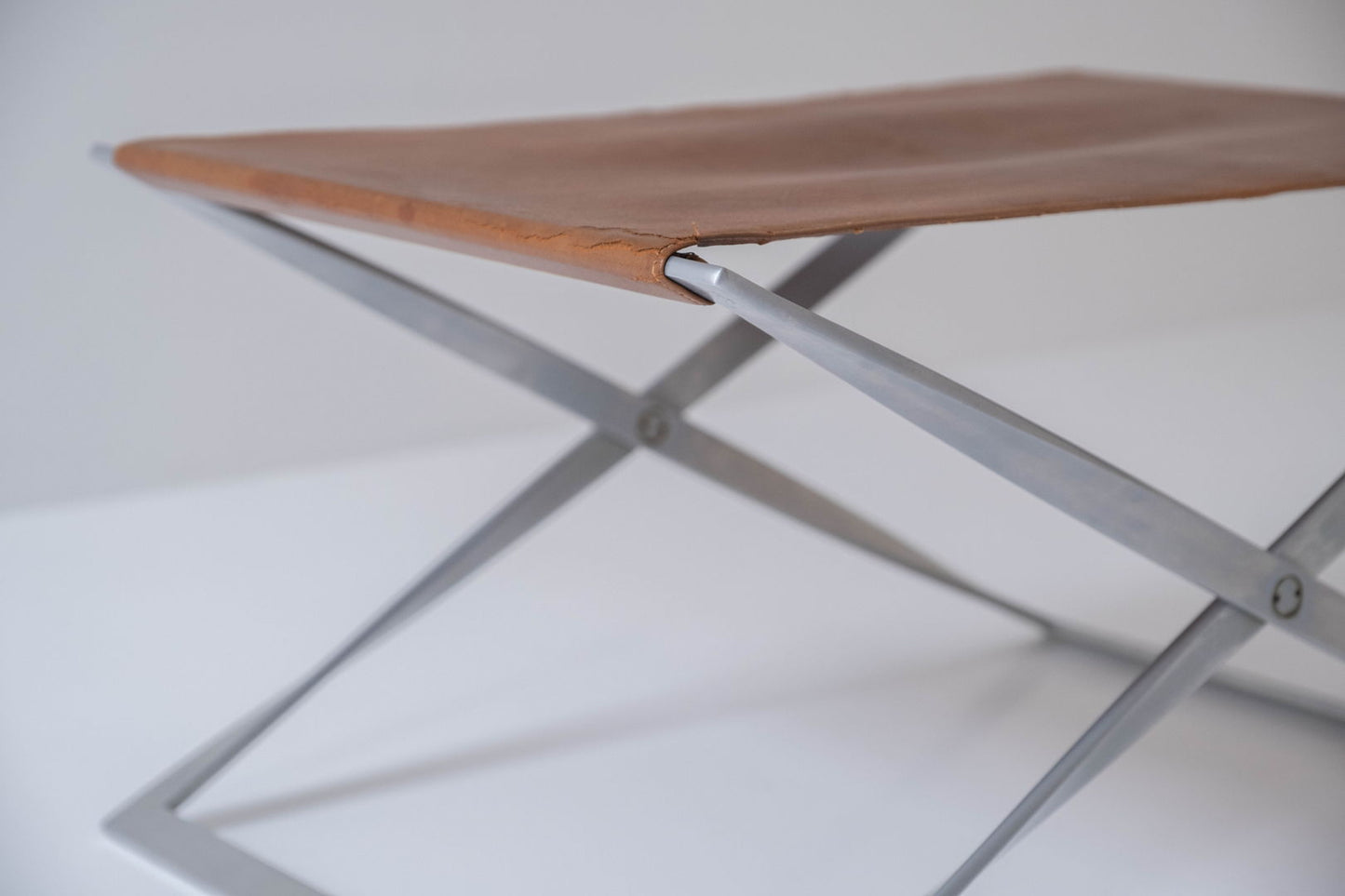 Iconic PK 91 folding stool designed by Poul Kjærholm and manufactured by E. Kold Christensen, Denmark 1961.