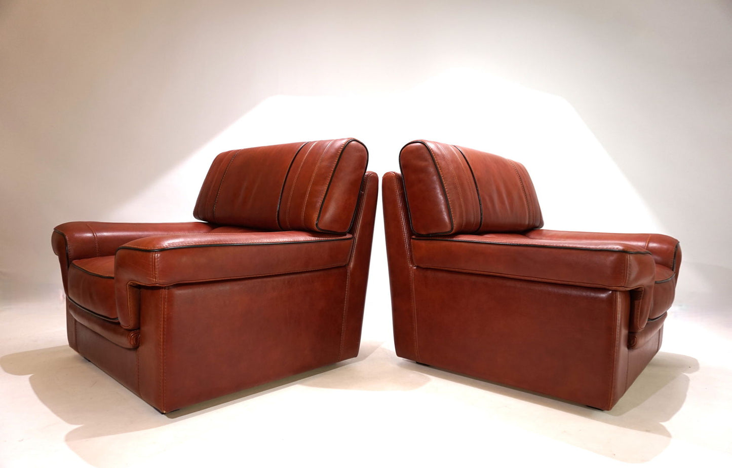 Set of 2 leather armchairs, cognac coloured, 1990
