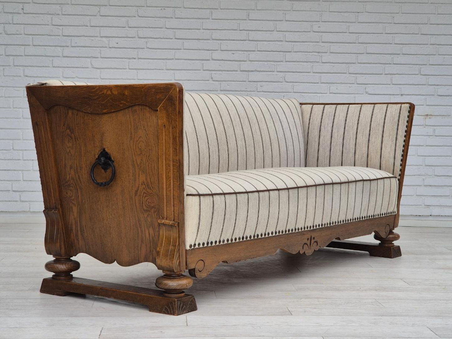 1950s, Danish 2 seater sofa in quality furniture wool, oak wood.