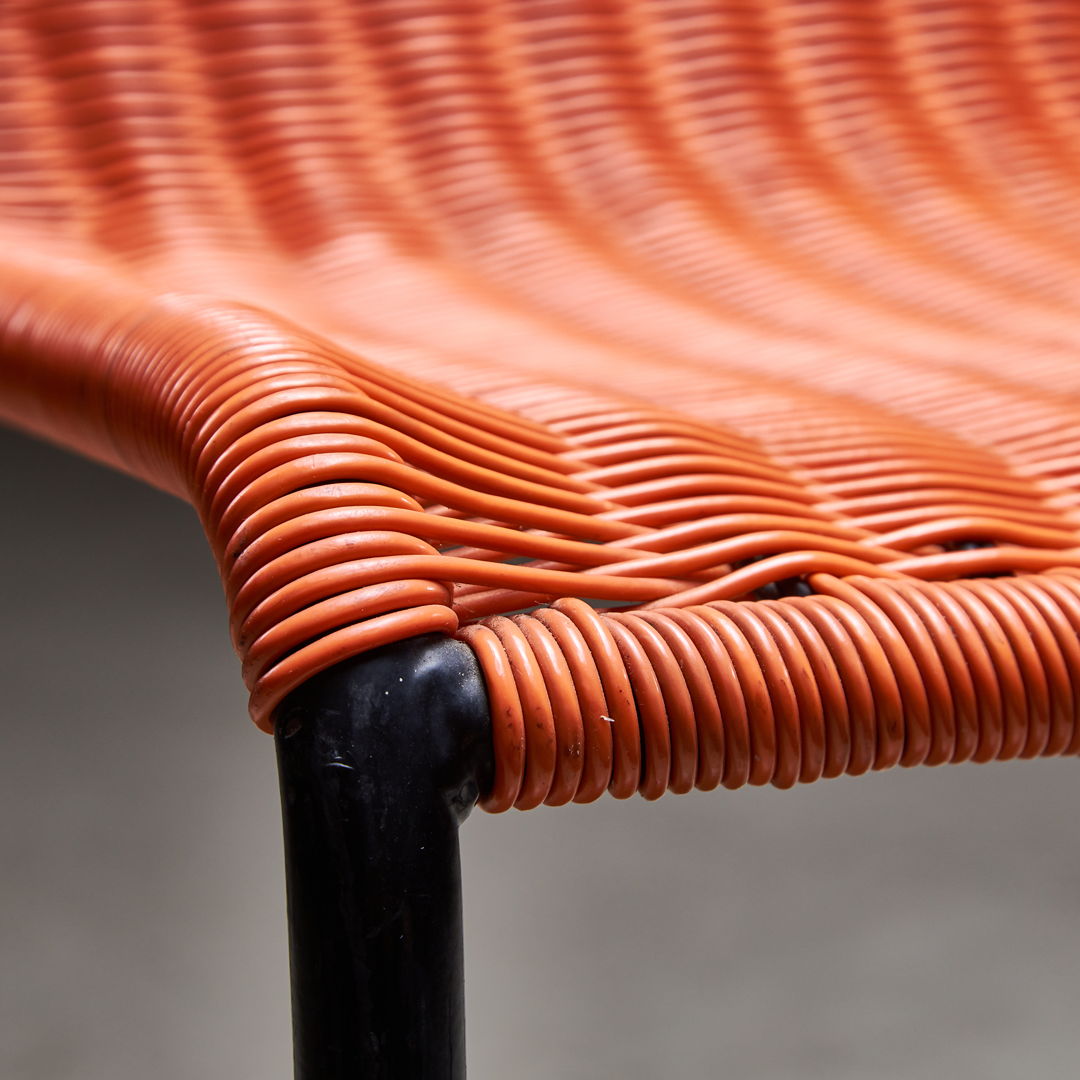 Orange braided plastic cable garden chairs