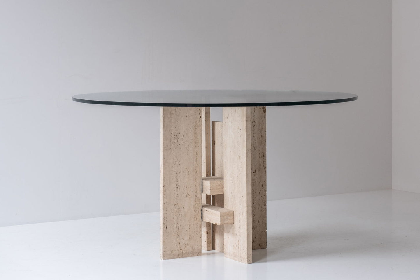 Travertine table with sculptural base designed and manufactured in the 1970s.