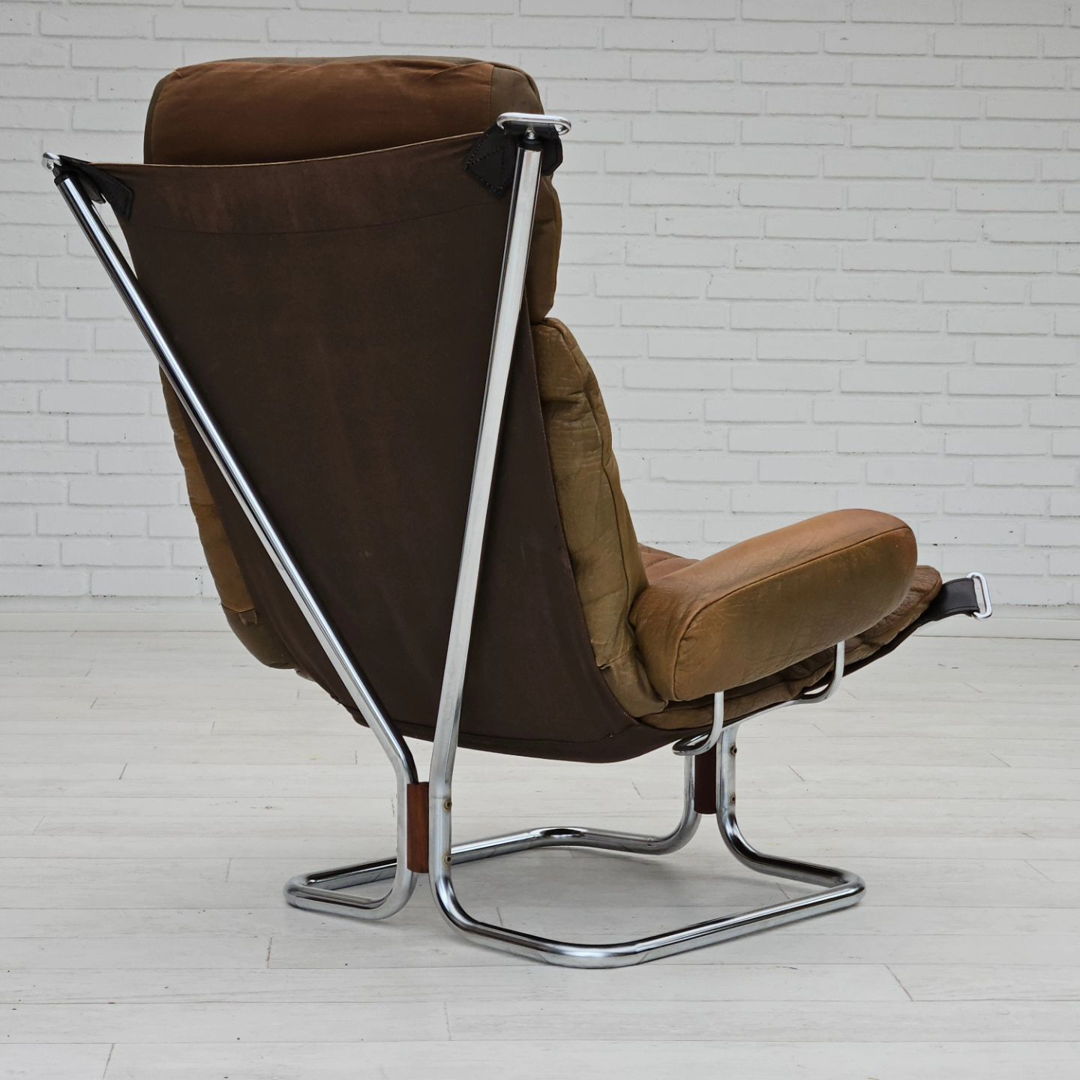 1970s, Norwegian design by Harald Relling, original condition, leather, chrome steel, teak wood, canvas.