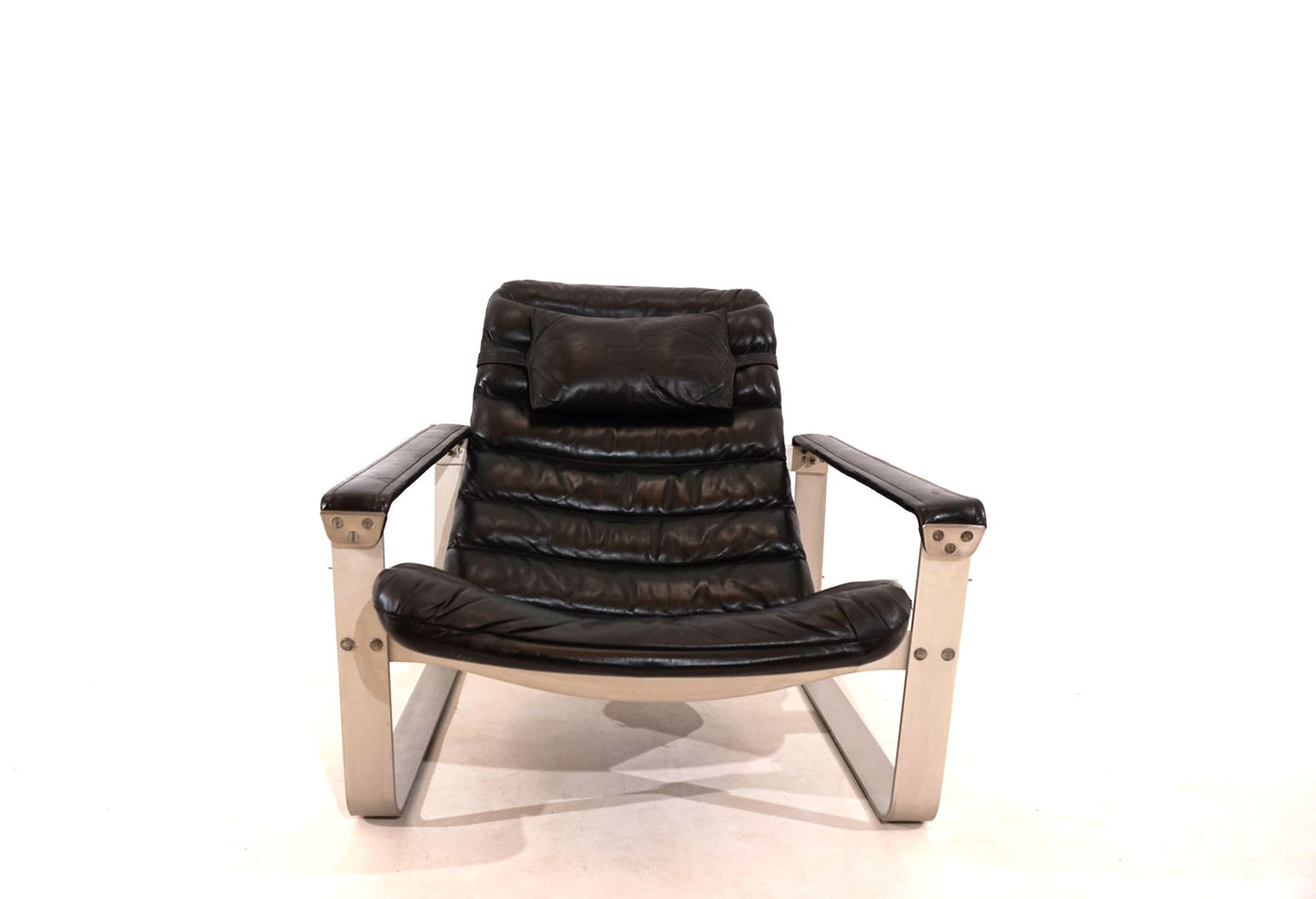 Asko Pulkka leather armchair with ottoman by Ilmari Lappalainen