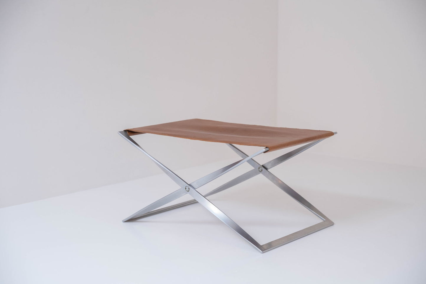 Iconic PK 91 folding stool designed by Poul Kjærholm and manufactured by E. Kold Christensen, Denmark 1961.