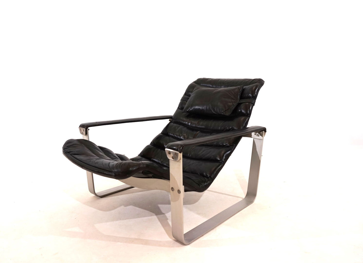 Asko Pulkka leather armchair with ottoman by Ilmari Lappalainen