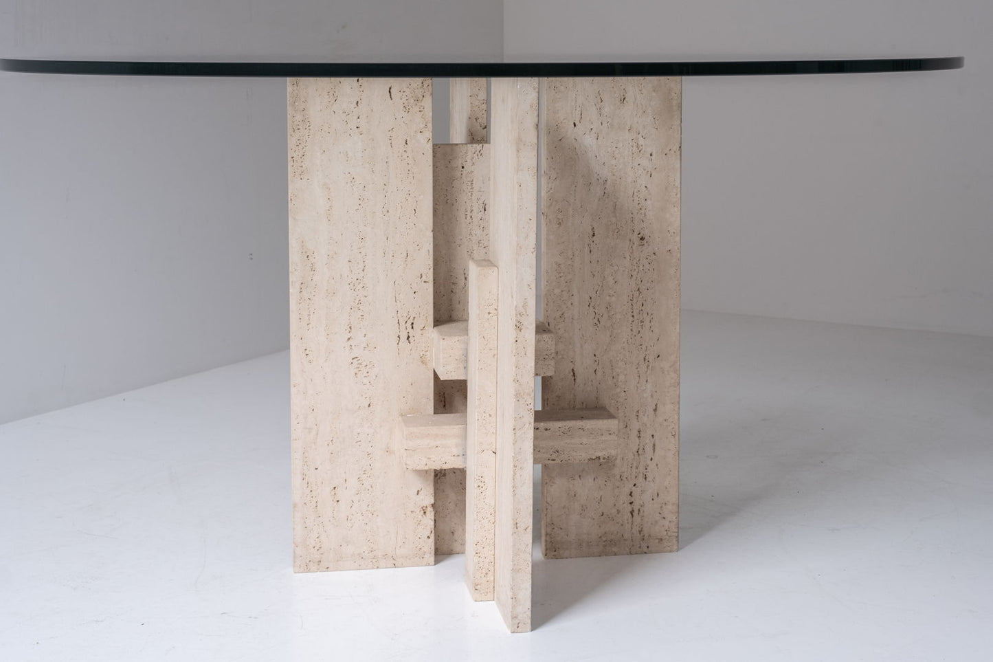 Travertine table with sculptural base designed and manufactured in the 1970s.