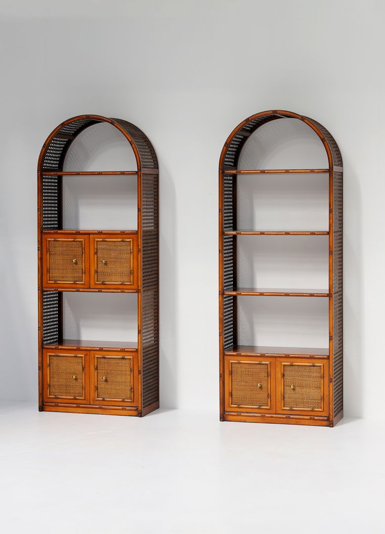 Pair of bohemian rattan bookcases with arch top and brass details 1970