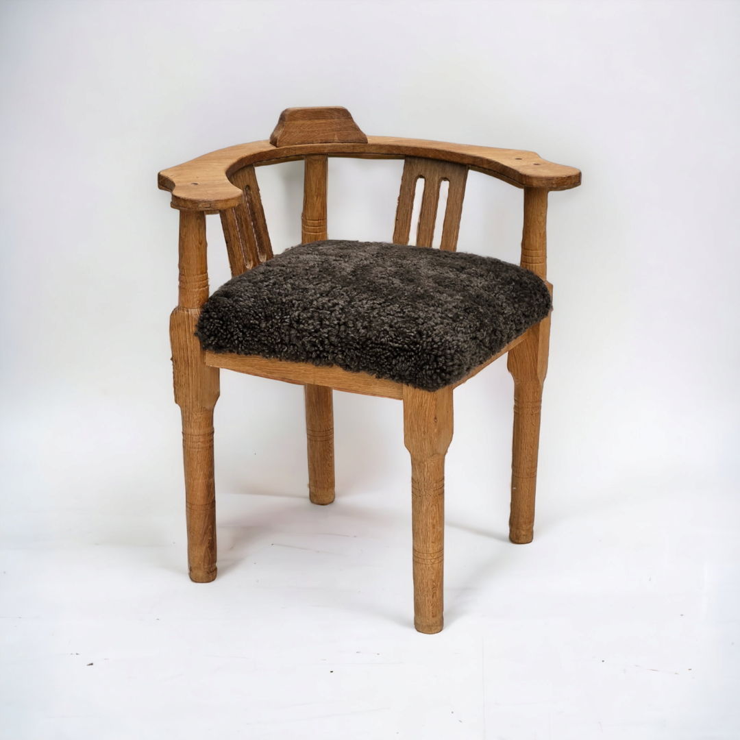 1950s, Danish design, reupholstered armchair, New Zealand sheepskin, oak wood.