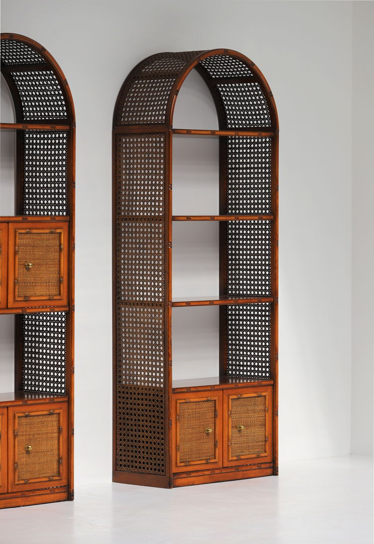 Pair of bohemian rattan bookcases with arch top and brass details 1970