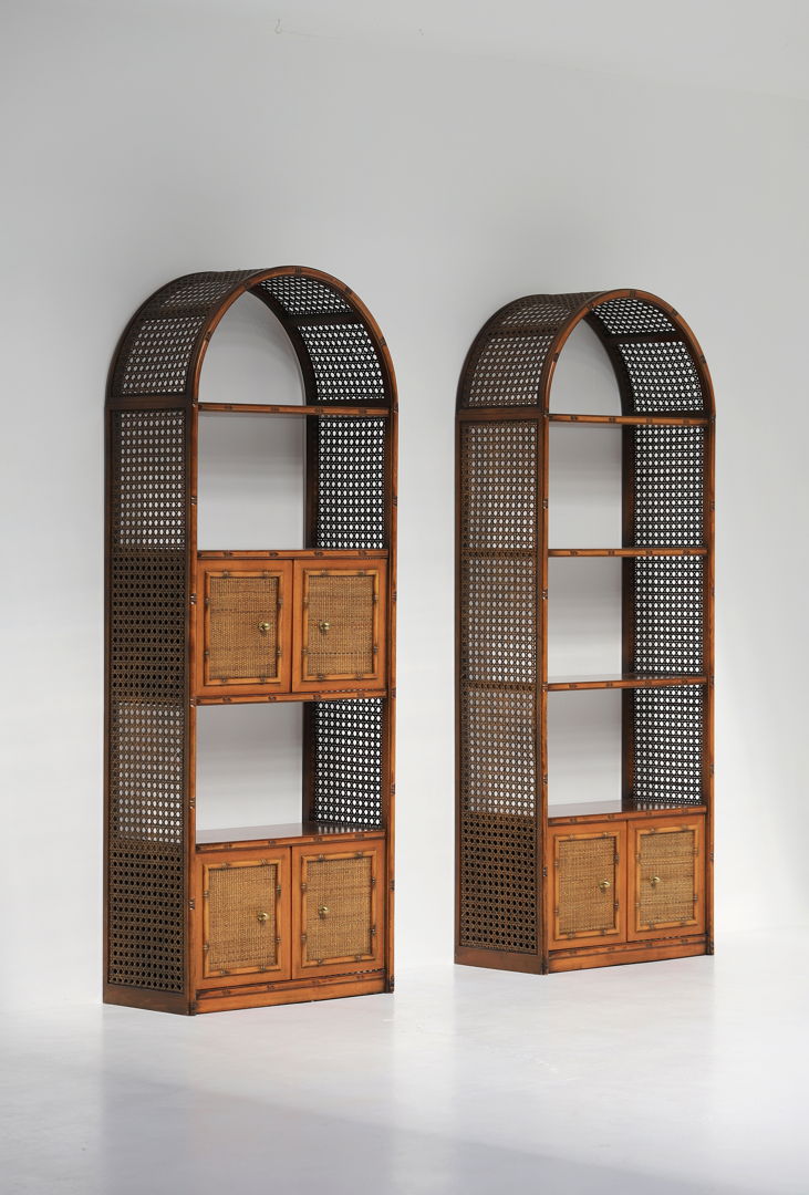 Pair of bohemian rattan bookcases with arch top and brass details 1970