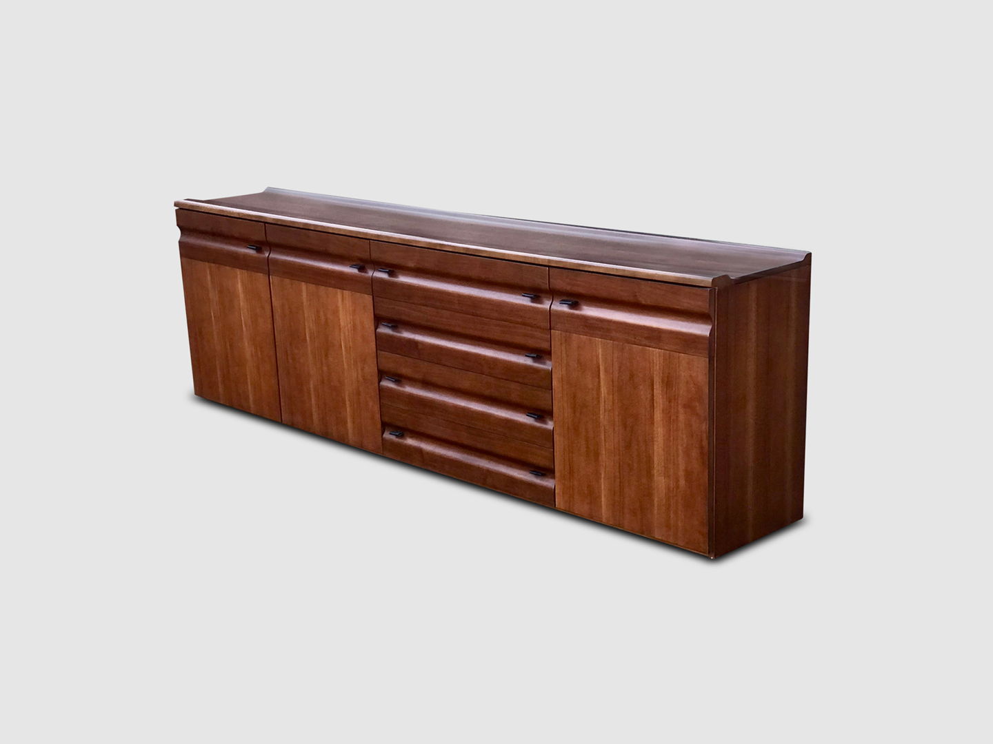 sculpted walnut and leather credenza Gavina Italy 1970s