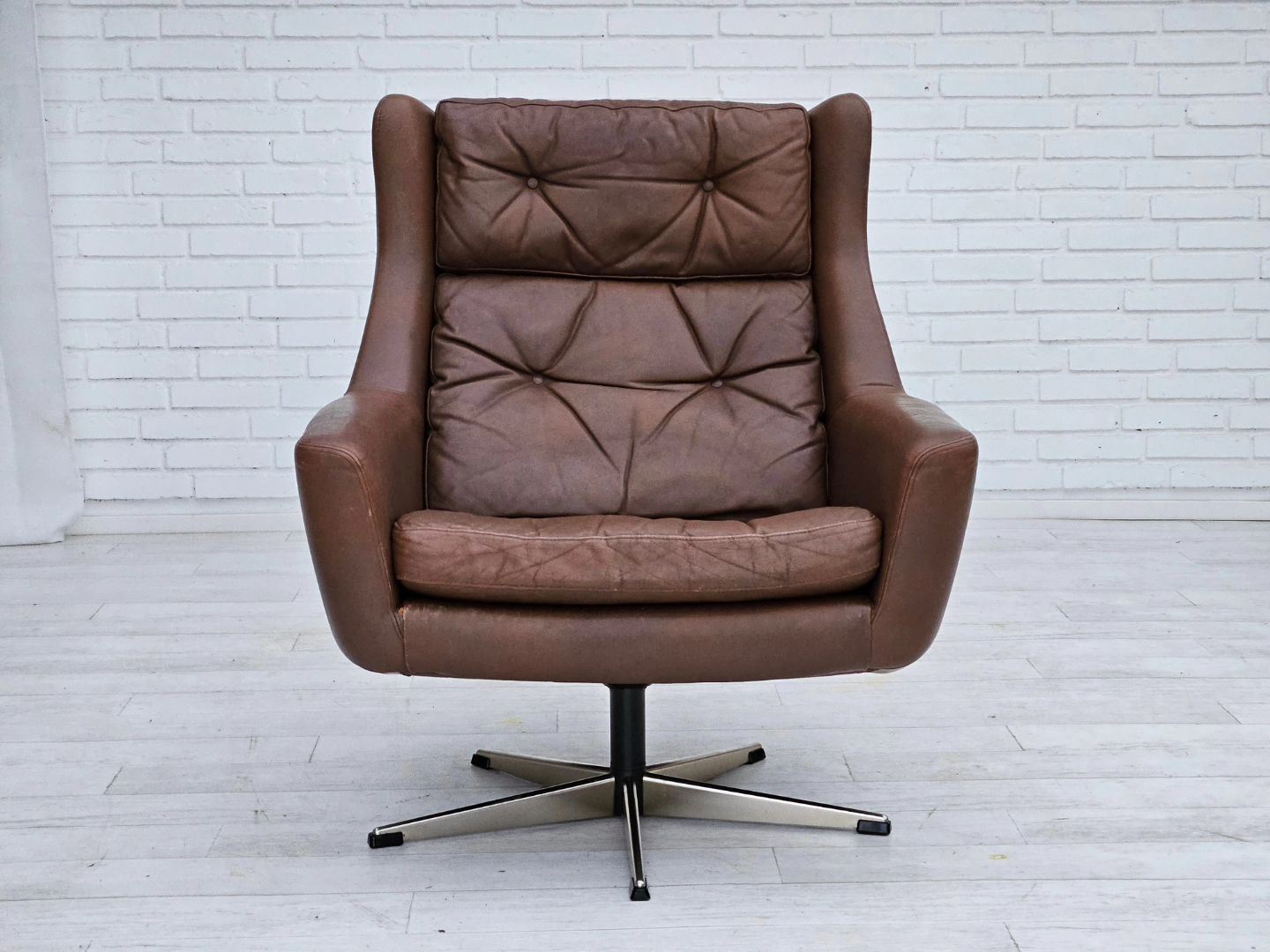 1970s, Danish swivel chair with footstool, original good condition, leather.