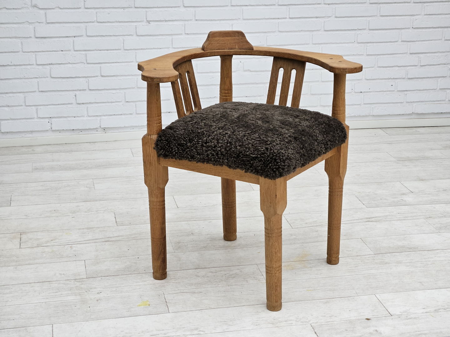 1950s, Danish design, reupholstered armchair, New Zealand sheepskin, oak wood.