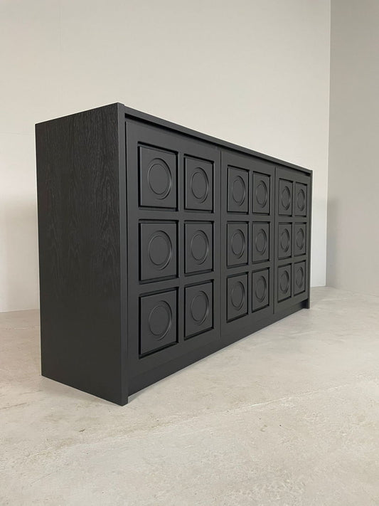 3 door black brutalist sideboard with circulair pattern