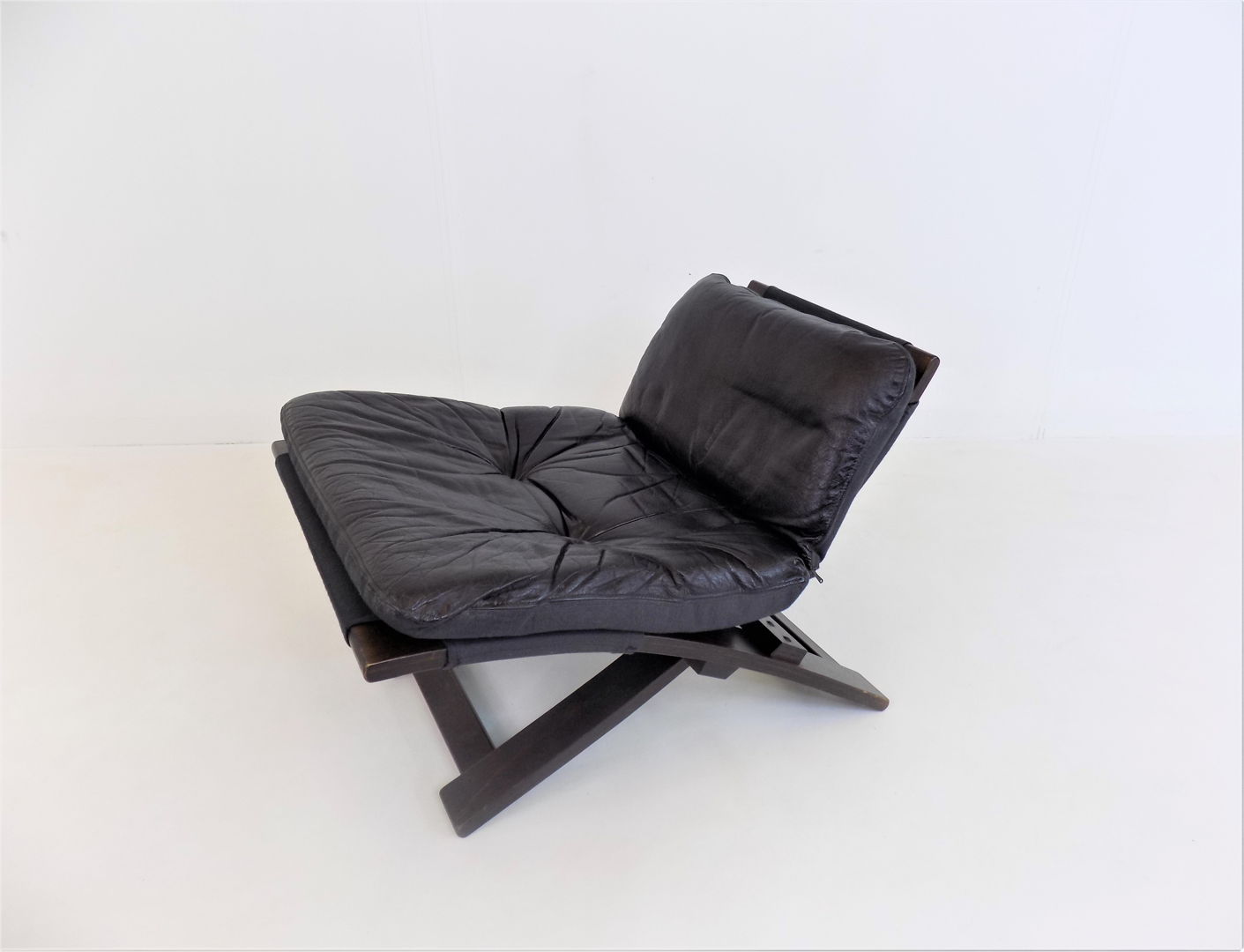 Nelo Kroken leather chair with ottoman by Ake Fribytter