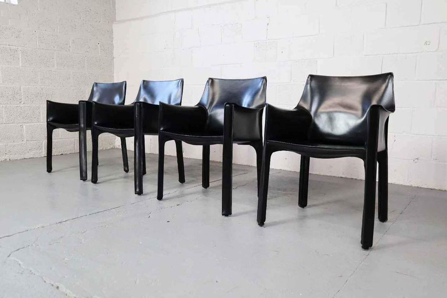 Cab 413 armchairs in black leather by Mario Bellini for Cassina