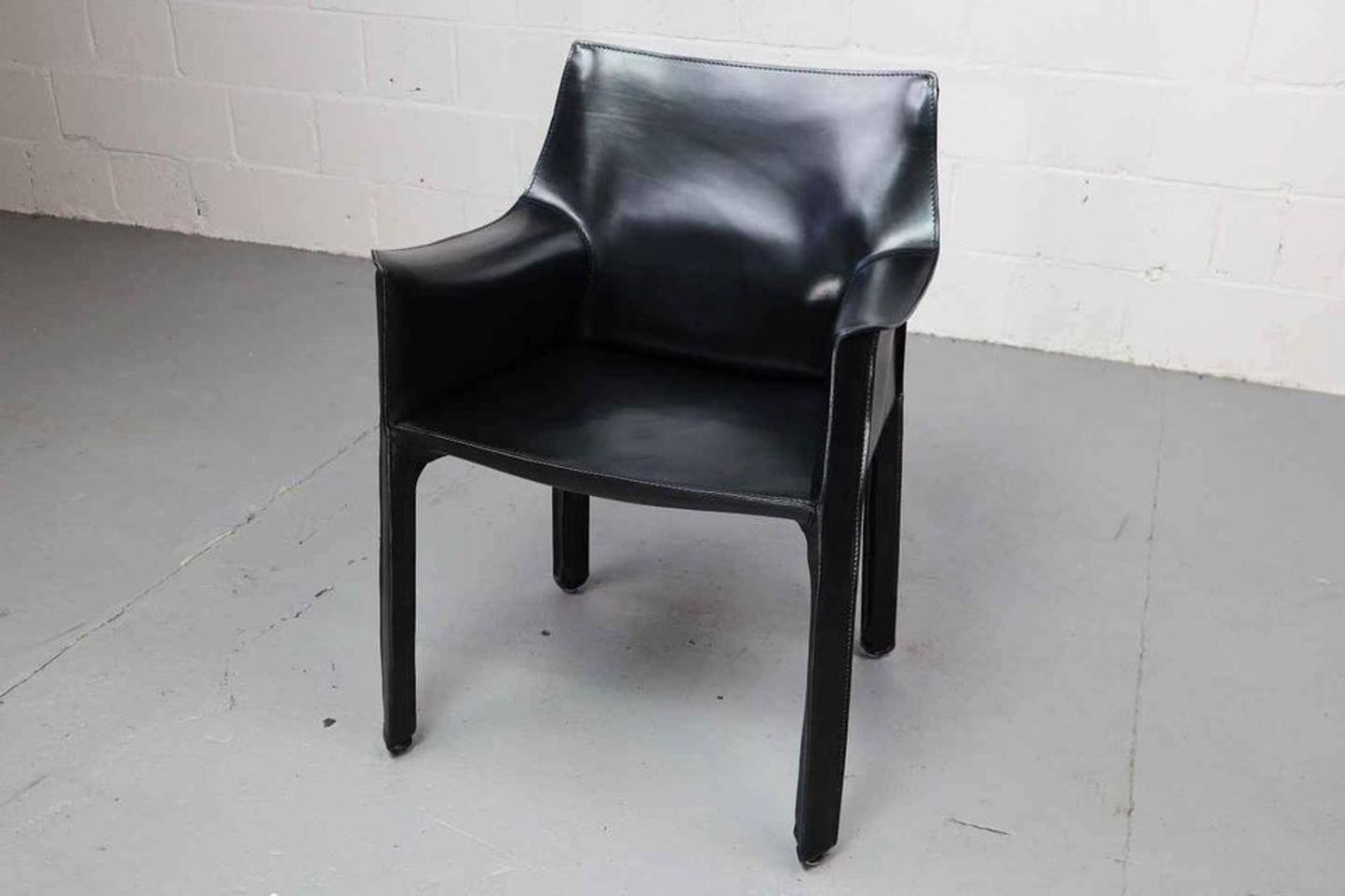 Cab 413 armchairs in black leather by Mario Bellini for Cassina