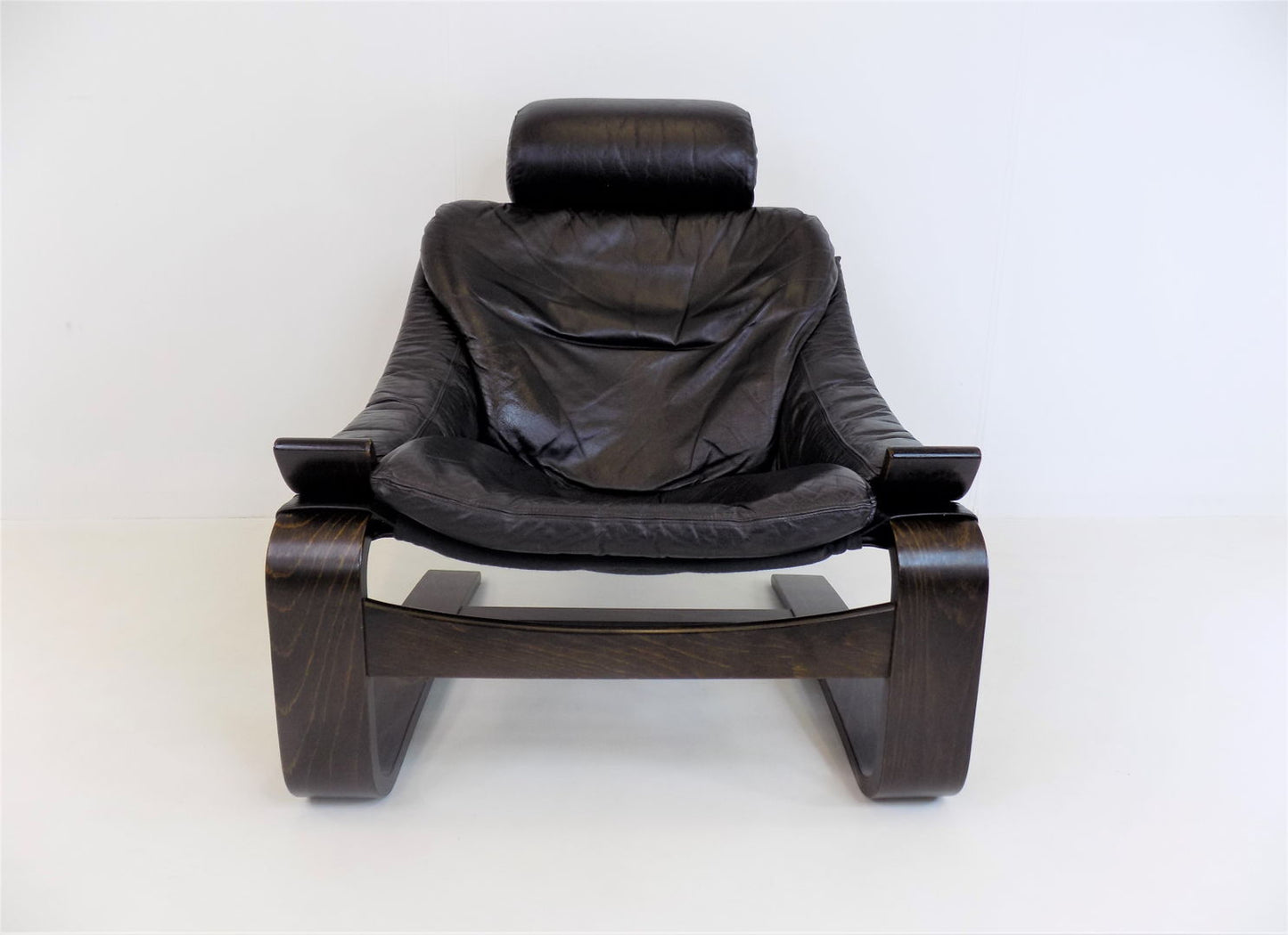 Nelo Kroken leather chair with ottoman by Ake Fribytter