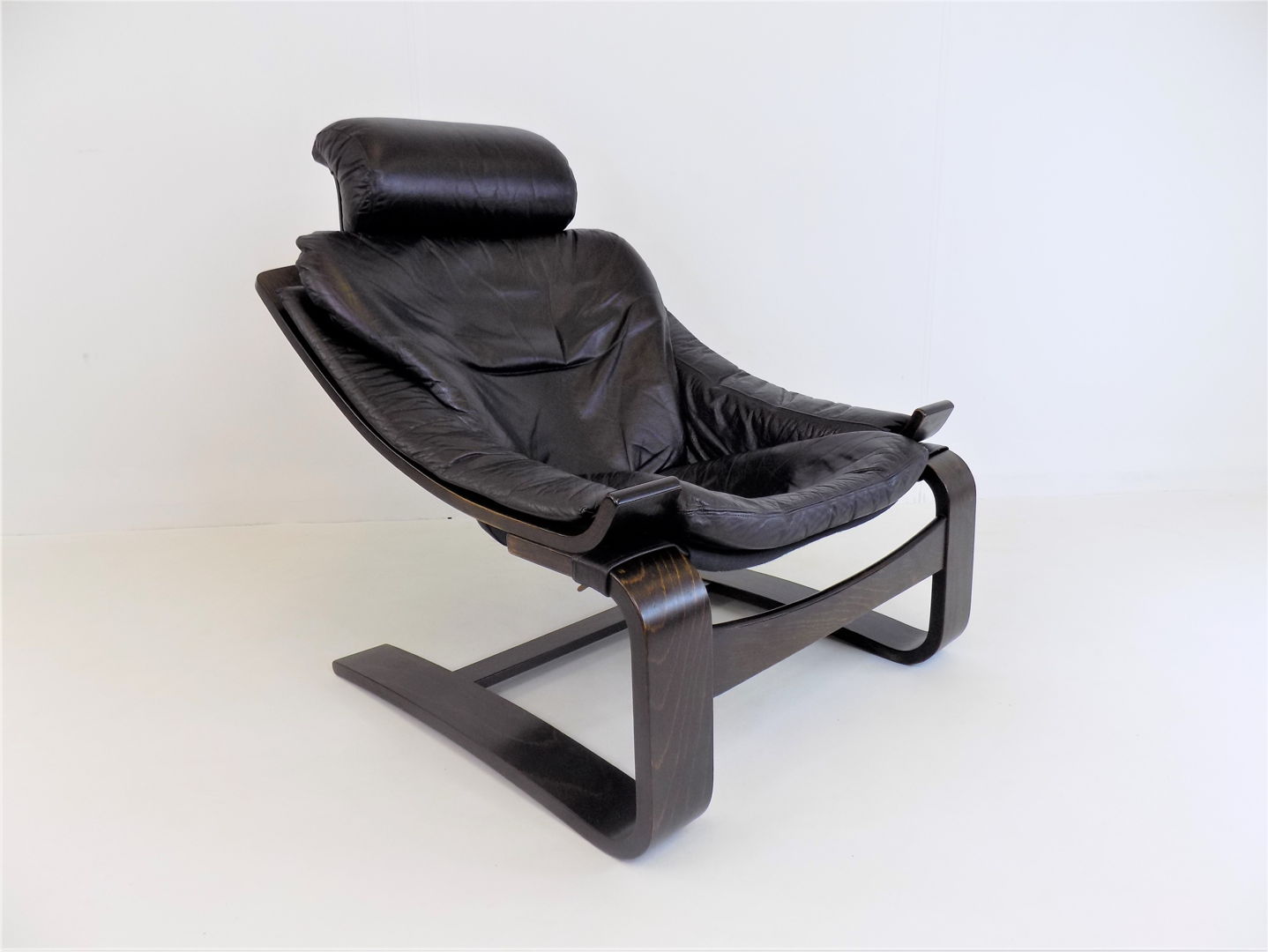 Nelo Kroken leather chair with ottoman by Ake Fribytter