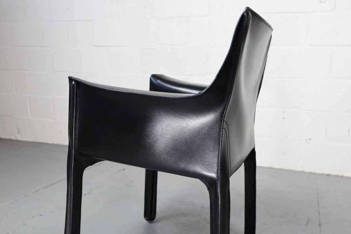 Cab 413 armchairs in black leather by Mario Bellini for Cassina