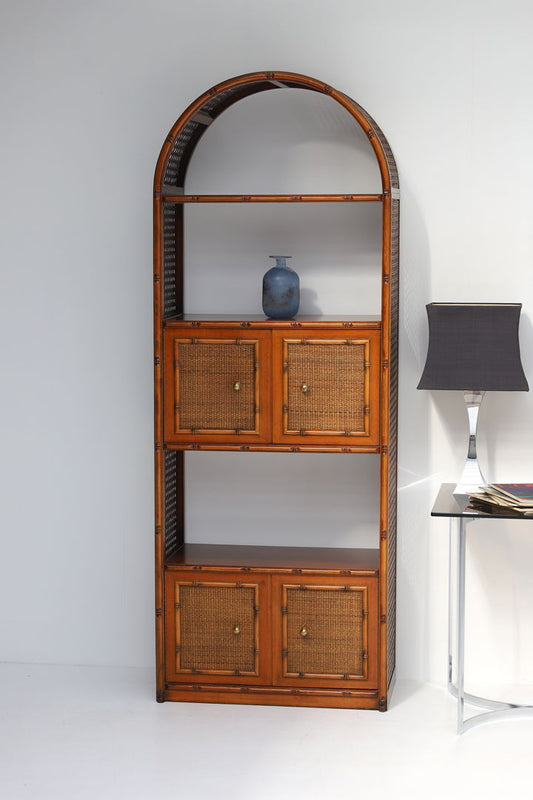 Pair of bohemian rattan bookcases with arch top and brass details 1970
