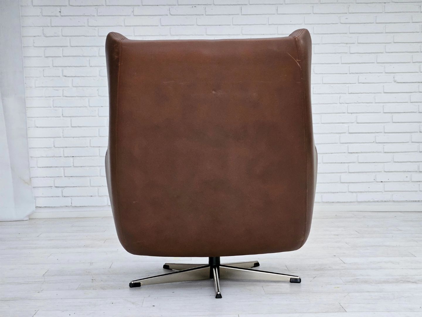 1970s, Danish swivel chair with footstool, original good condition, leather.